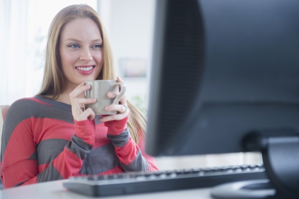 Young woman in front of computer