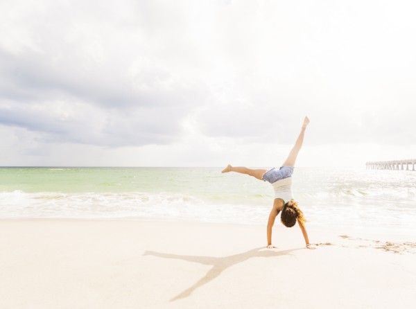 Woman exercising on beach
