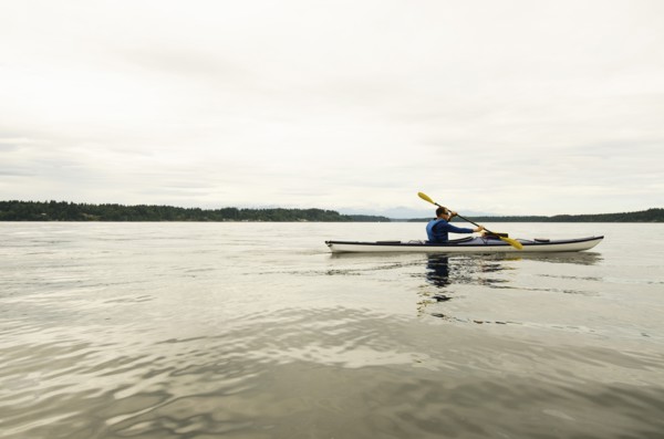 Man kayaking on lake