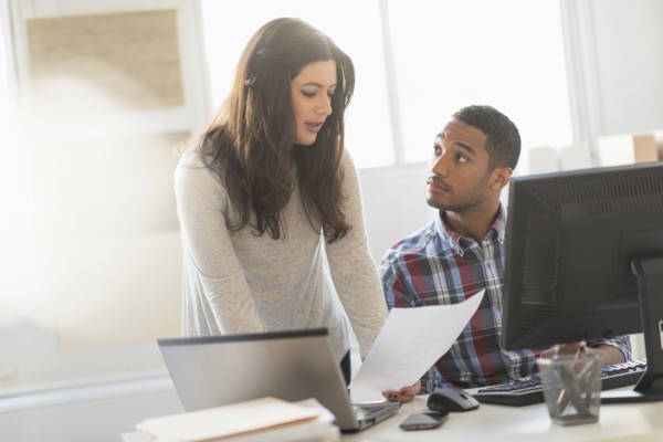 Business couple working in office.