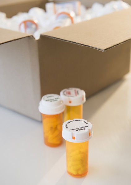Cardboard box and medicine containers