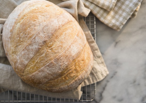 Studio shot of bread on dishcloth