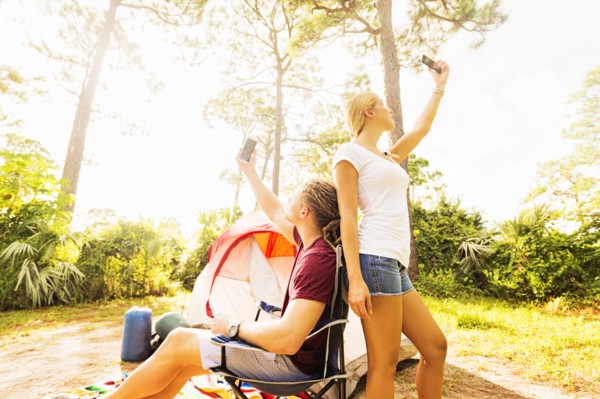 Couple looking for range on cell phone