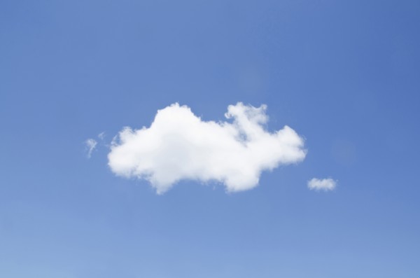 White cumulus cloud in clear blue sky