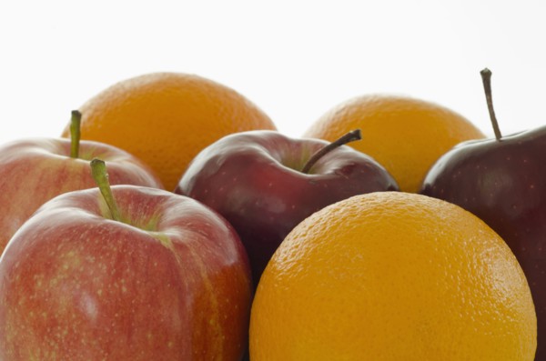 Studio shot of apples and oranges