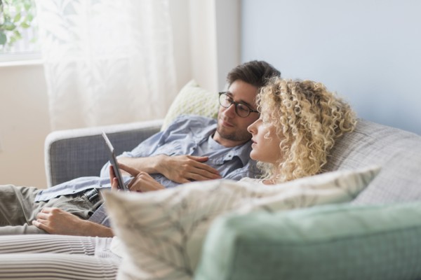 Couple using tablet pc.
