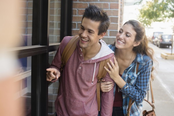 Young couple walking on street