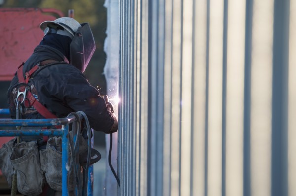 Man welding steel bar