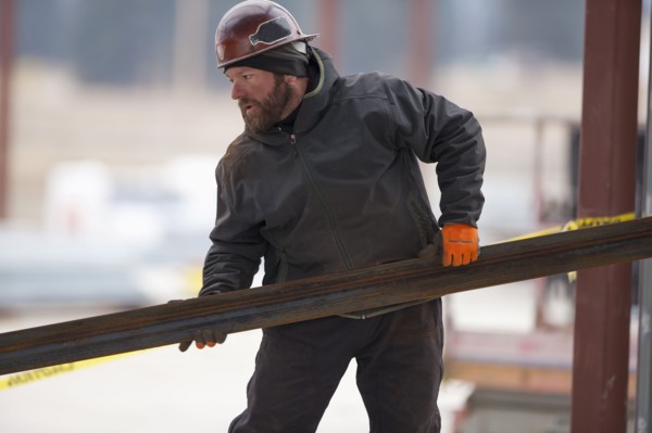 Man lifting steel bar