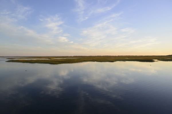 Sky reflecting in still bay