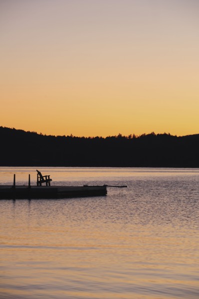 Jetty on lake at dawn