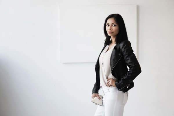 Portrait of young woman in studio.