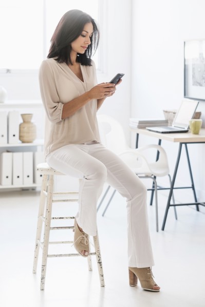 Woman using smart phone.