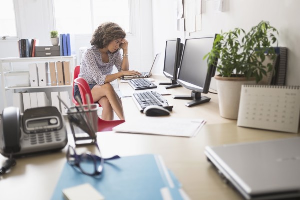 Young woman working at office.