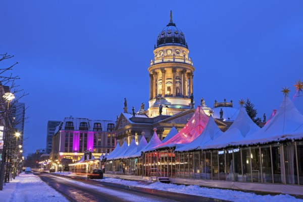 Christmas Market and illuminated steeple of French Cathedral