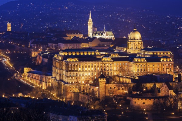 Cityscape with illuminated Royal Palace and Matthias Church