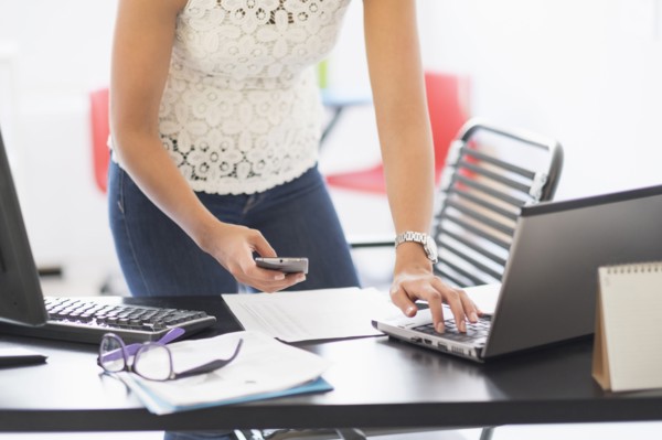 Young woman working in office.