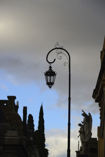 Argentina, Buenos Aires, Recoleta Cemetery, Sculpture and antique street light