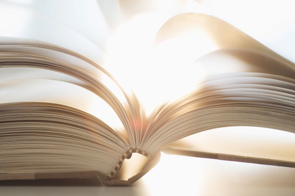 Book on table.