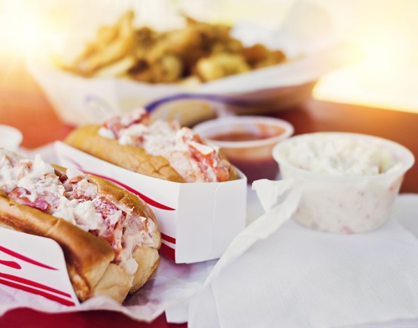 View of lobster sandwiches and salad