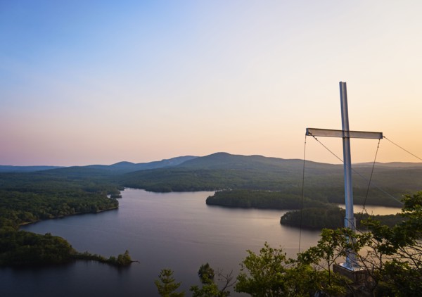 Landscape with cross at dusk