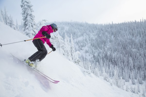 Woman skiing downhill
