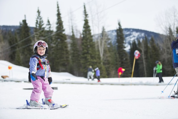 Little girl (2-3) learning skiing