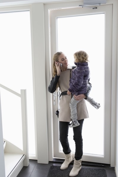 Mother holding son (4-5)