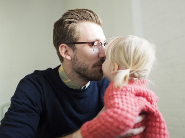 Father kissing daughter's (2-3) nose