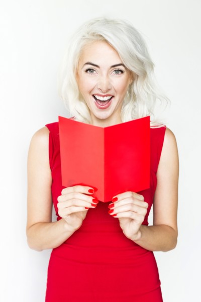 Studio shot of woman wearing red dress