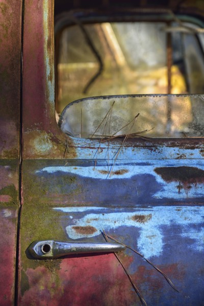 Colorful door of abandoned truck