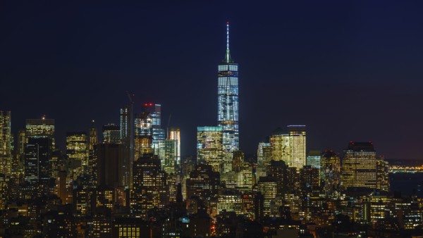 Illuminated cityscape at night. New York City, New York, USA.