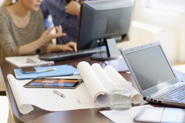 Man and woman working in office.