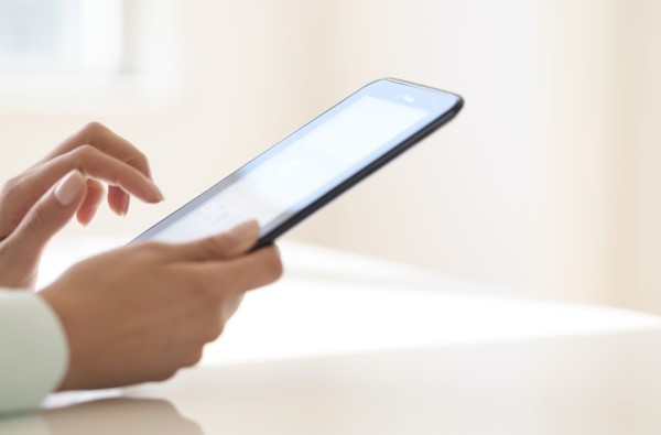 Hands using tablet pc.