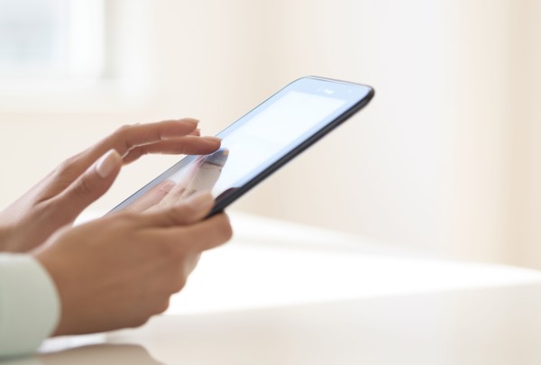 Hands using tablet pc.