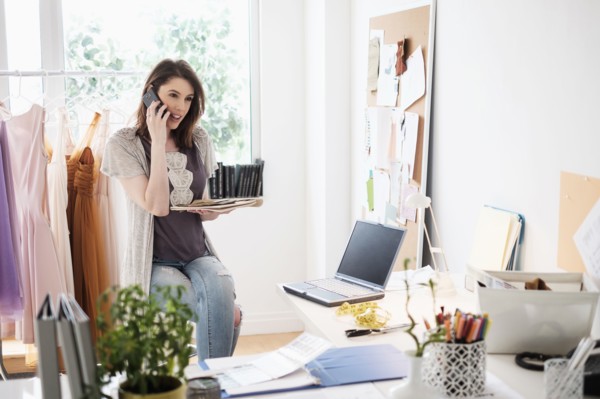 Female fashion designer in her office.