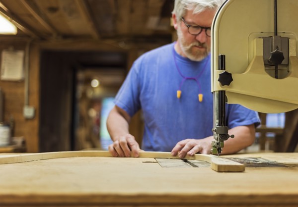Carpenter working in workshop