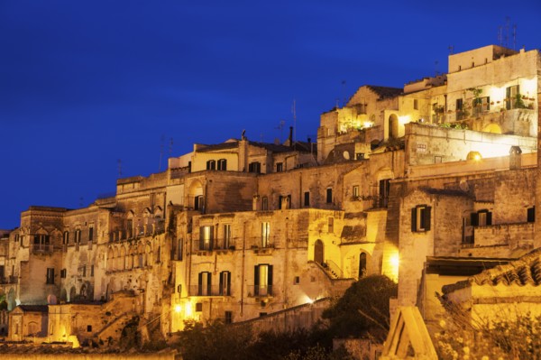 Illuminated city buildings at dusk