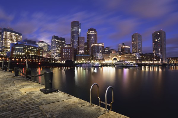 Waterfront reflected in Fort Point Channel at dawn
