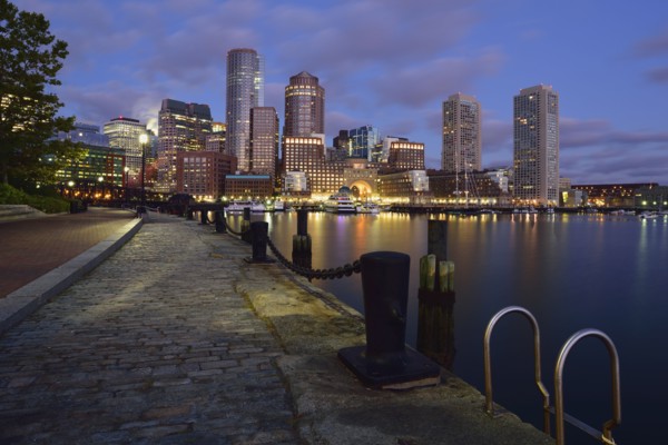 Waterfront reflected in Fort Point Channel at dawn