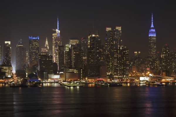 Illuminated cityscape at night