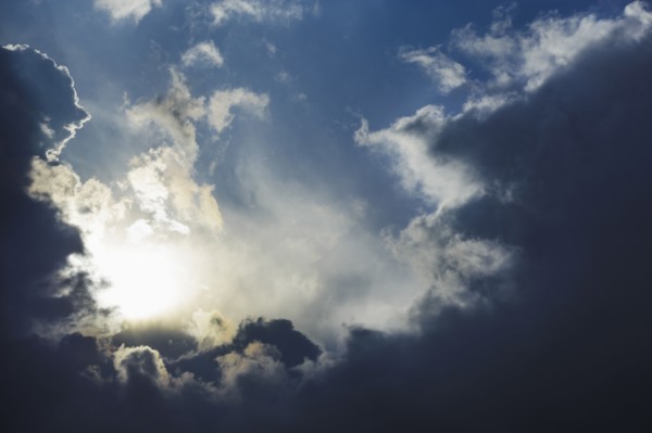 Dramatic sky, clouds and sun trying to break through