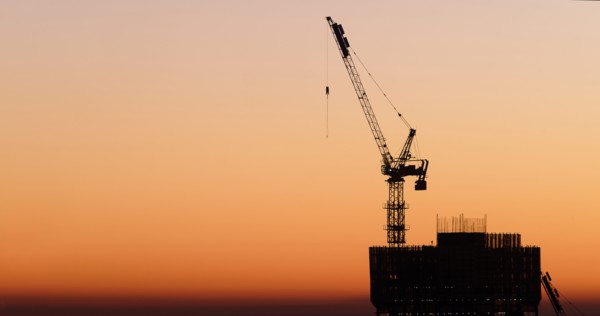 Silhouette of skyscraper under construction. New York City, New York, USA.