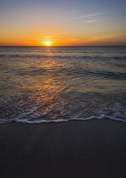 Beach and sea at sunset