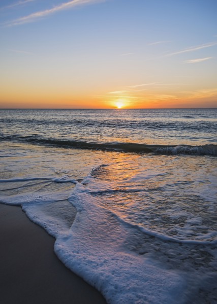 Beach and sea at sunset