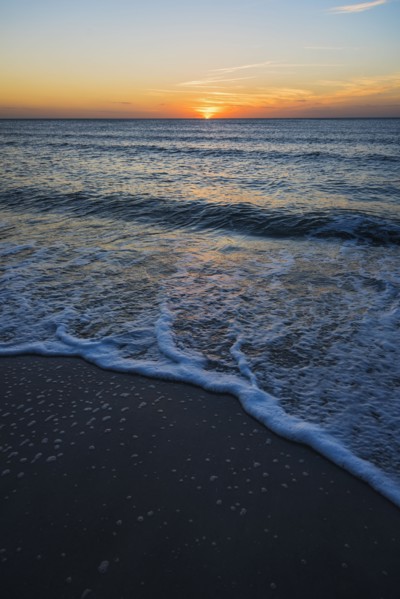 Beach and sea at sunset
