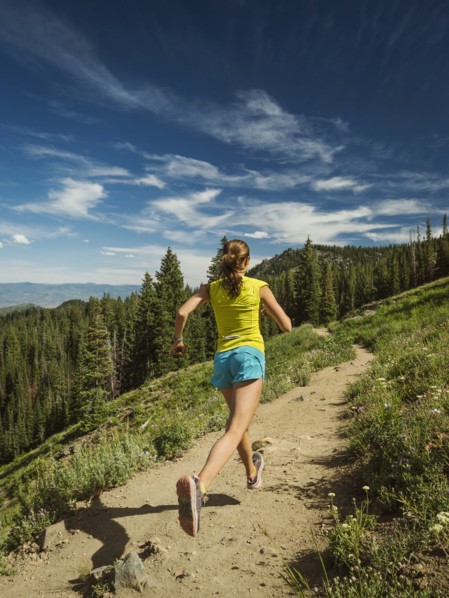 Mature woman running in mountains