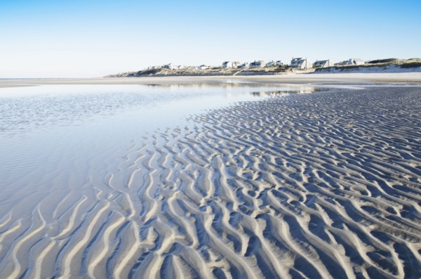 Beach at low tide with rippled sand