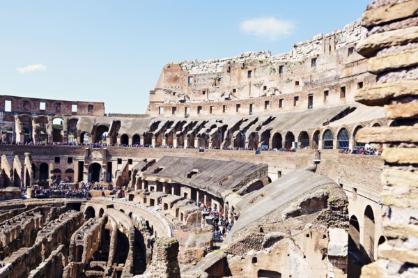 Ruins of Coliseum under blue sky