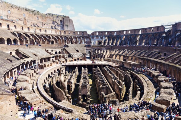 Ruins of Coliseum under blue sky